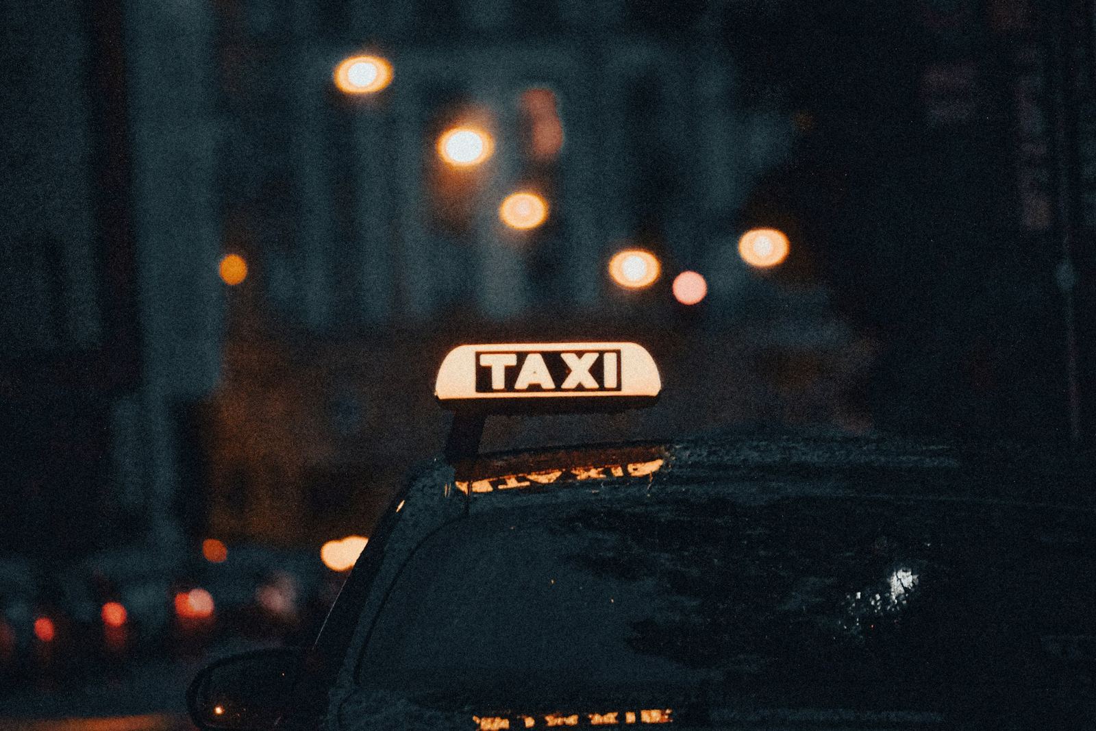 RideGo car on a city street at night